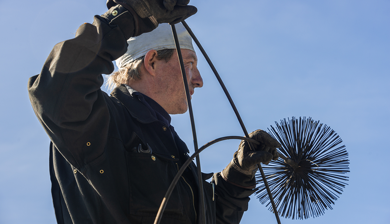 Photo d'un ramoneur pour illustrer le CTM fumiste option ramoneur