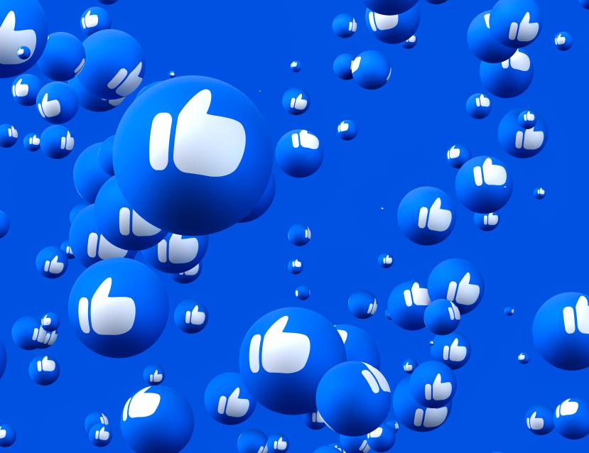 Bulles avec des Likes (pouce en l'ai) Facebook sur un fond bleu